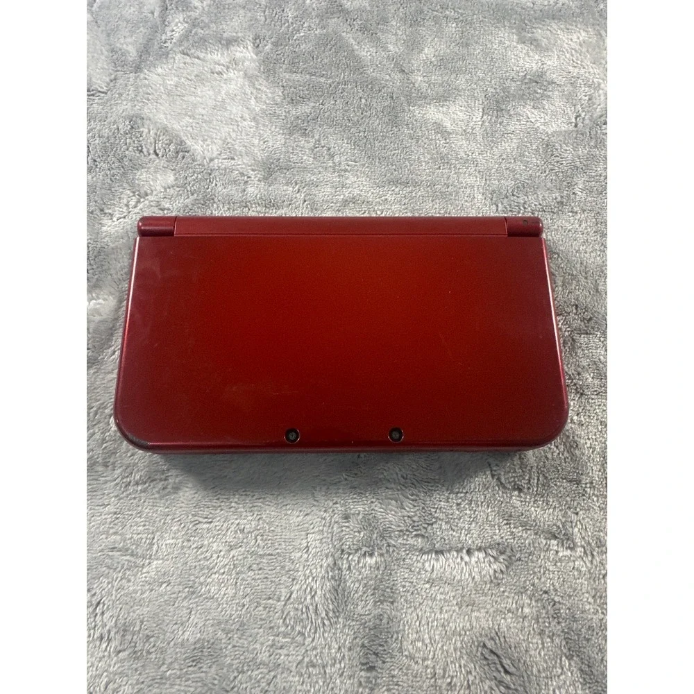 Nintendo New 3DS XL Metallic Red. Stylus and charger NOT included